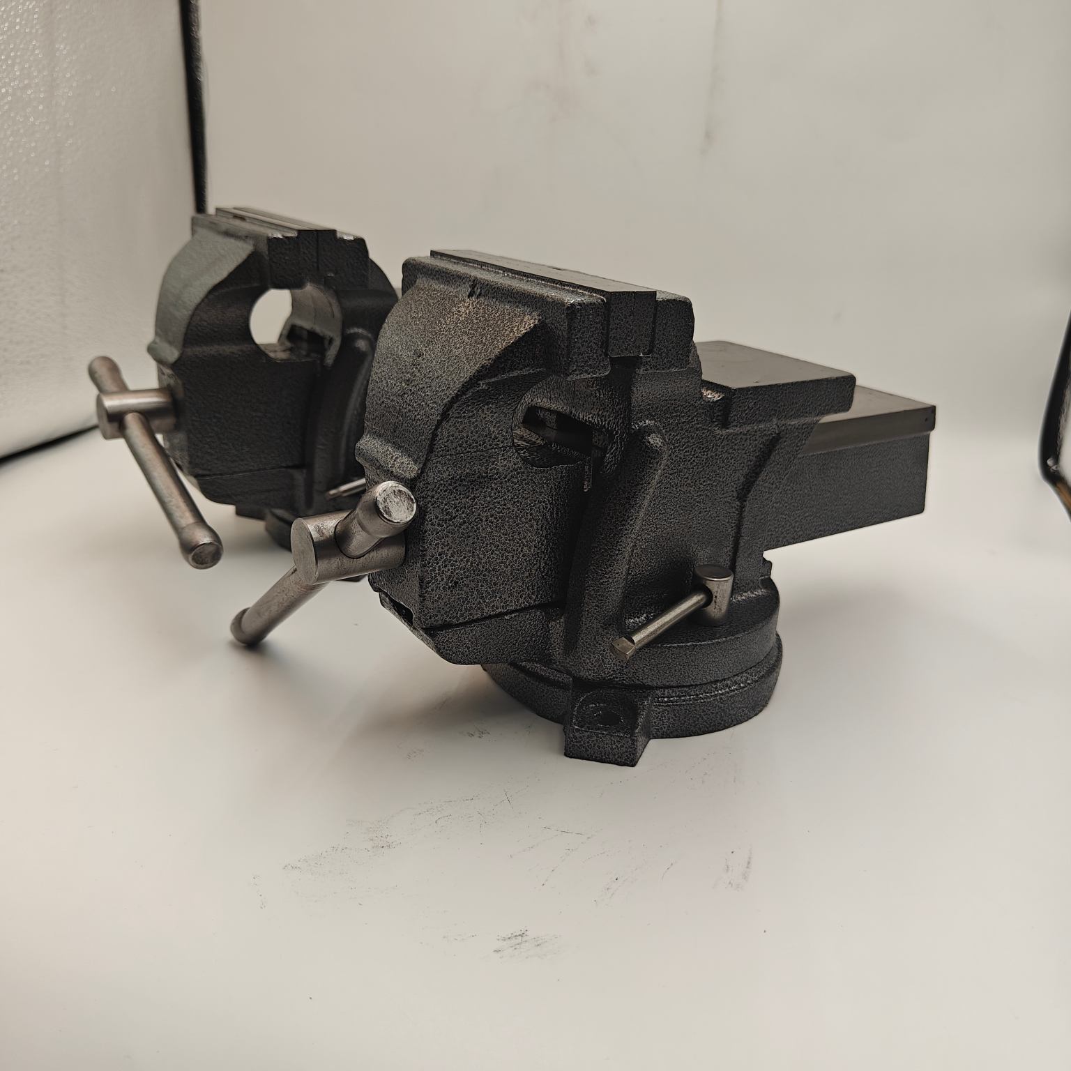 What are the functions and applications of the bench vise?